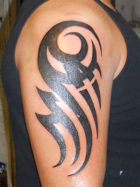 12 Meaningful Tribal Tattoos For Men Tribal Tattoos For Men Tribal