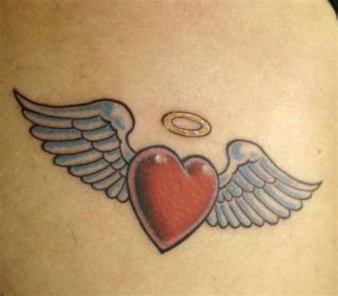 20 Wings Tattoos Heart With Wings Tattoo Sacred Heart Tattoos