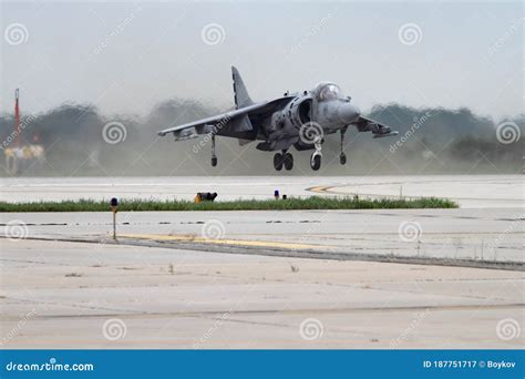 A Military Harrier Airplane In Vertical Takeoff Motion At The Annual