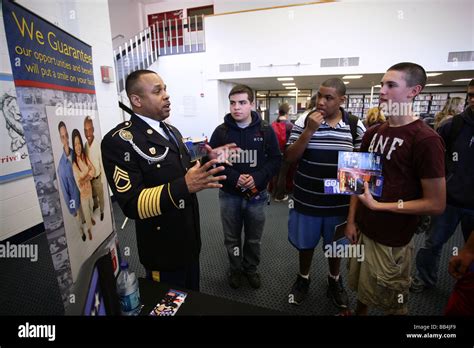 A Us Coast Guard Recruiter Talks With High School Students In Connecticut About Military Career