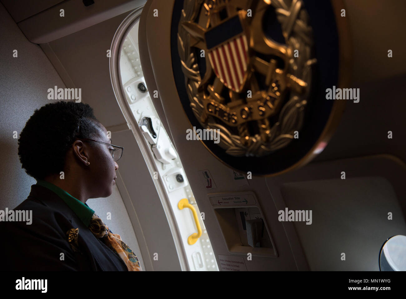 An Air Force Flight Attendant Opens The Hatch Of A Nara Dvids