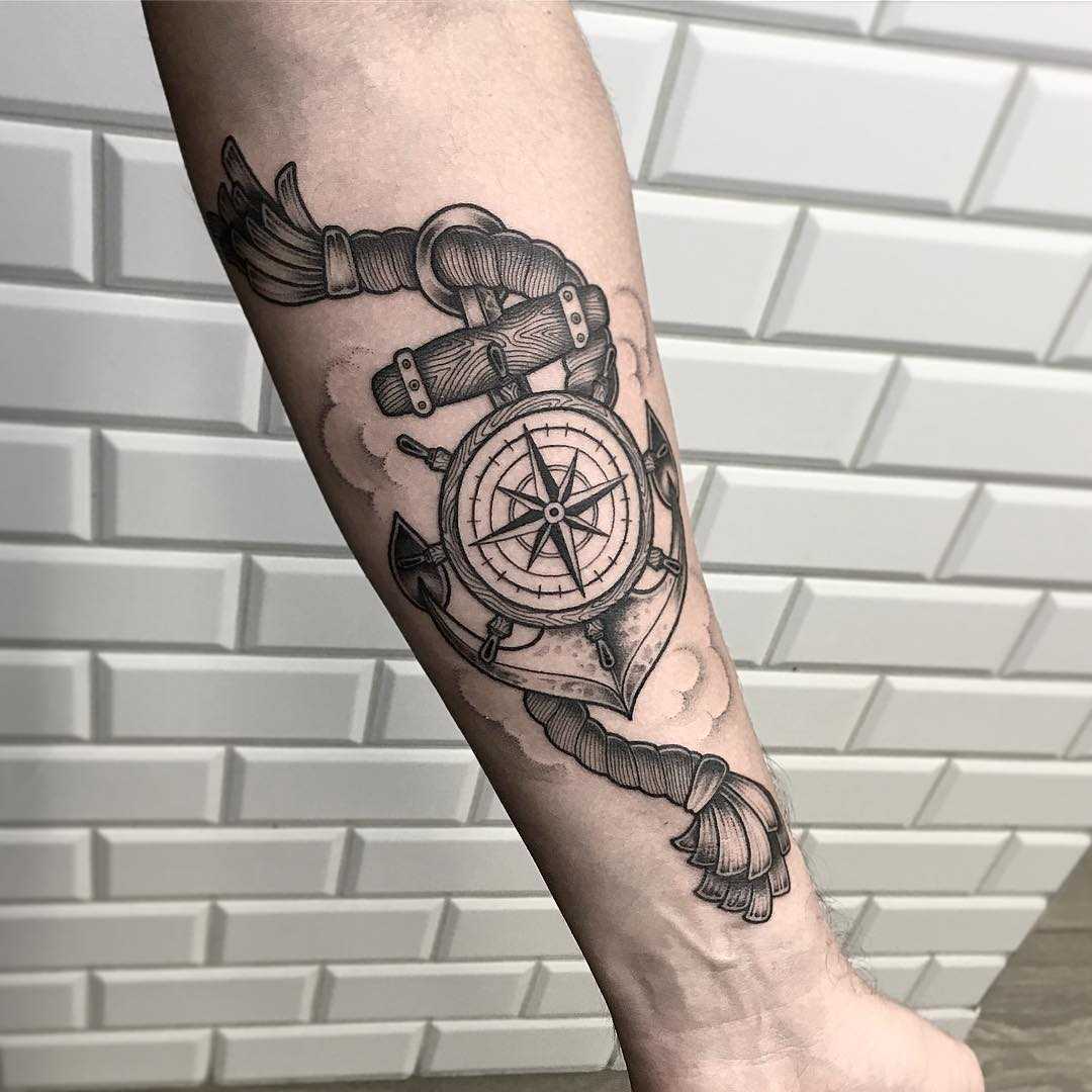 An Anchor And Compass Tattoo Design