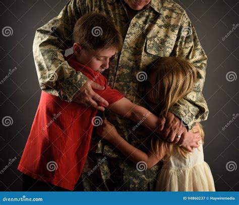 Army Soldier Father Hugging Family At Home Stock Image Image Of Door