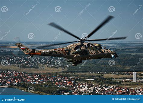 Attack Helicopter Mi 35P In Flight View From A Parallel Helicopter