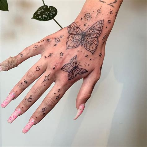 Delicate Hand Tattoo Designs