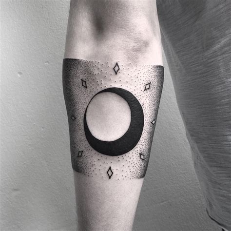 Elegant Solar Eclipse Tattoos