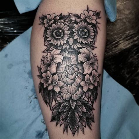 Gorgeous Very Realistic Looking Multicolored Owl With Flower Tattoo On