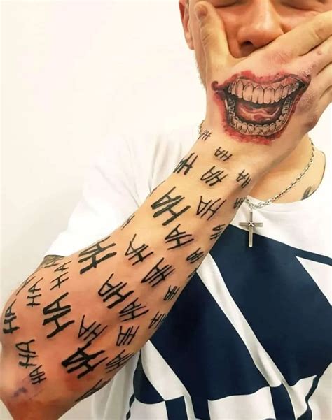 Hand Joker Smile Tattoo Meaning