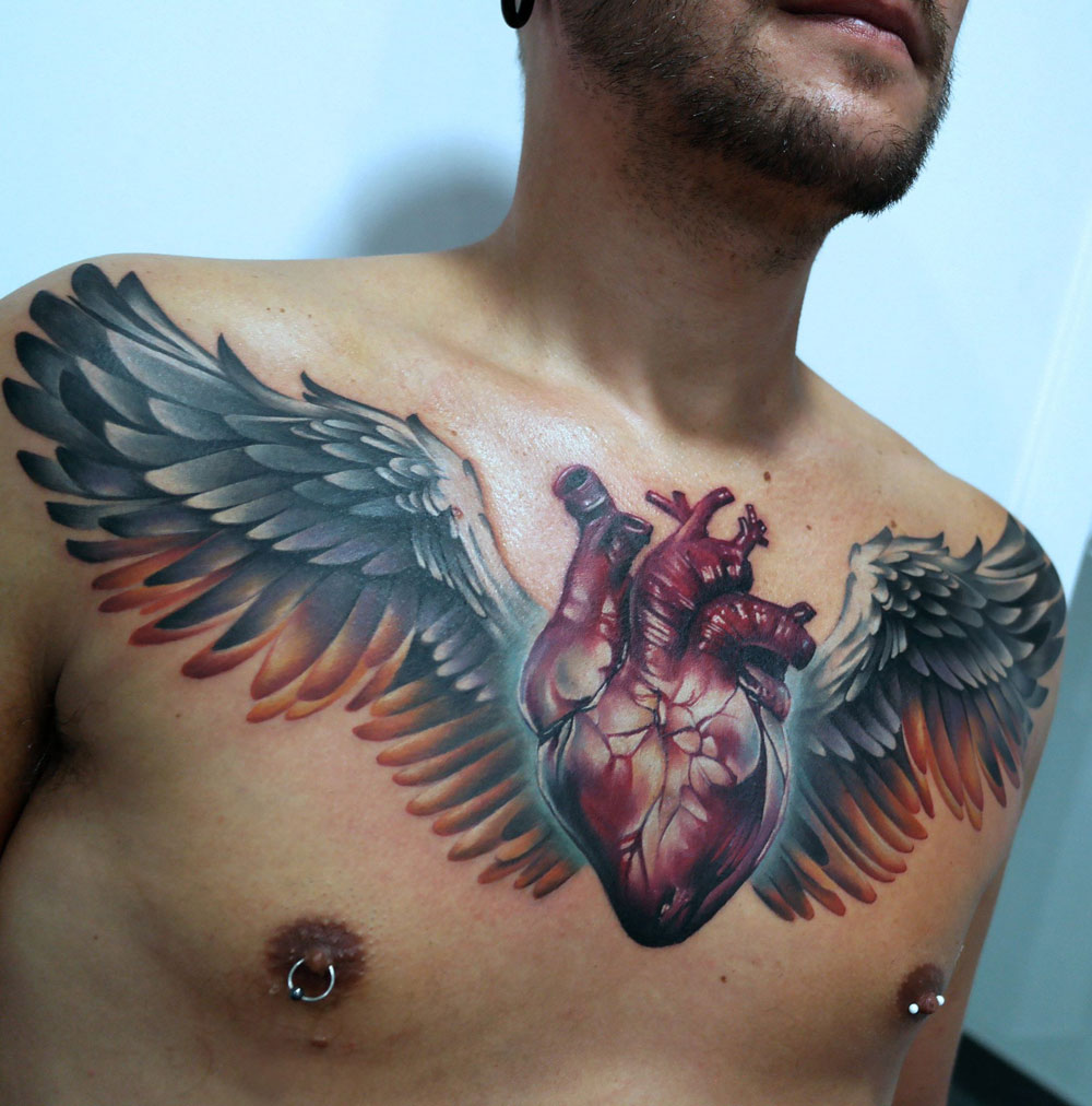 Heart Wings On Guy S Chest Best Tattoo Design Ideas