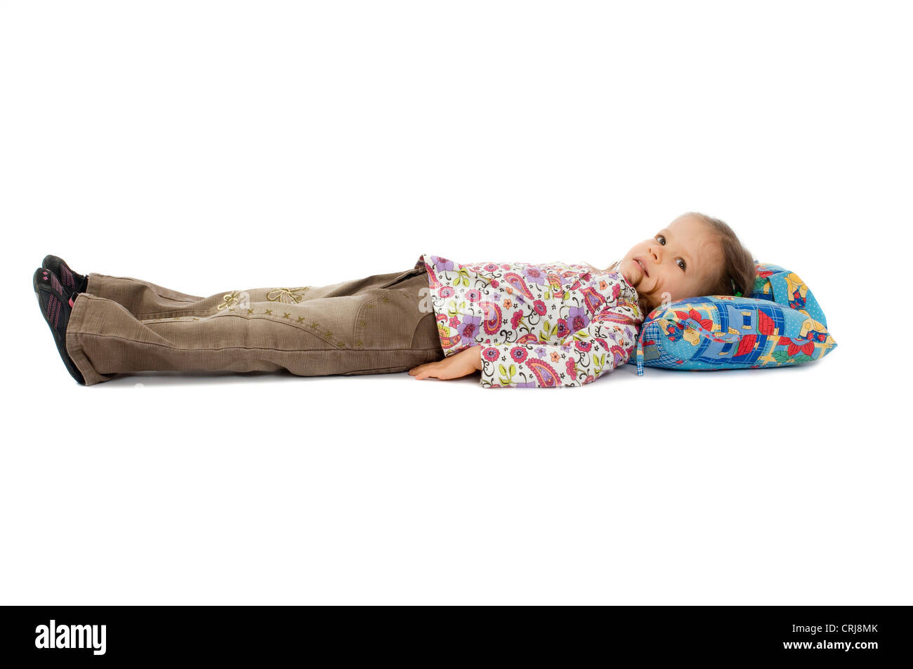 Little Girl Lying On The Floor On Her Back The Arms Close To The Stock