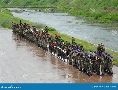 Military Training Or Bootcamp With People In The Rain For A Drill At A