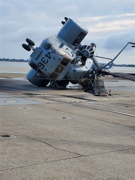 Photos Navy Helicopters Toppled After Strong Thunderstorms Roll