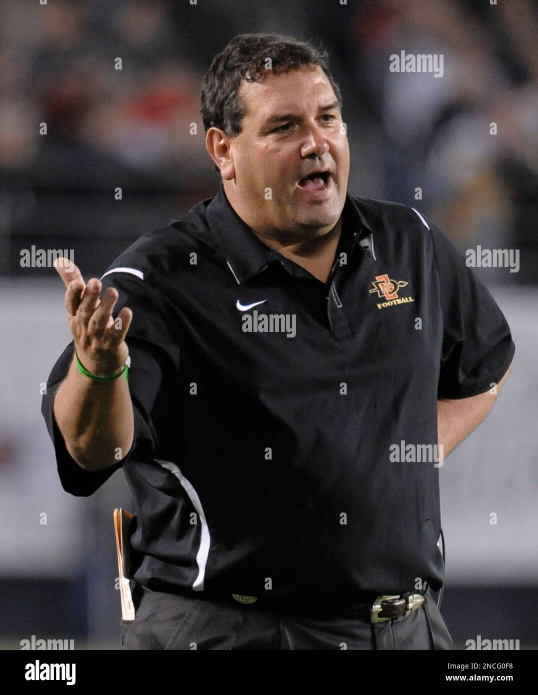 San Diego State Coach Brady Hoke Tries To Communicate During The First