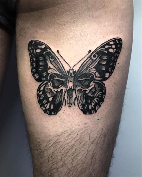 Skull With Butterfly Tattoos