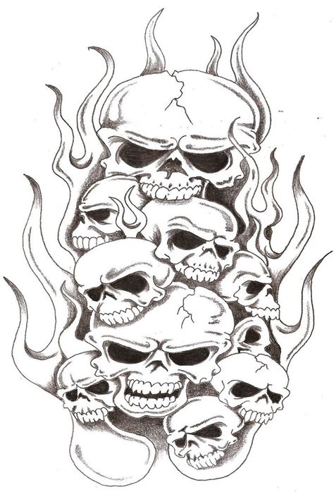 Skull With Flames Tattoo Designs