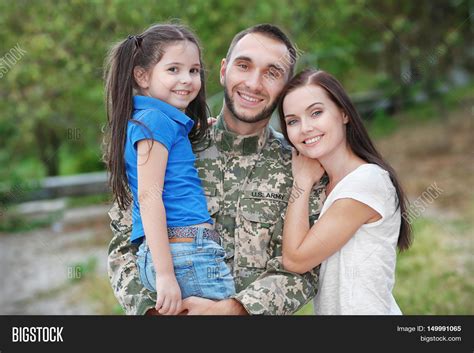 Soldier Holding Family Together