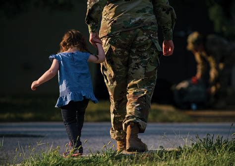 Soldier Holds Family