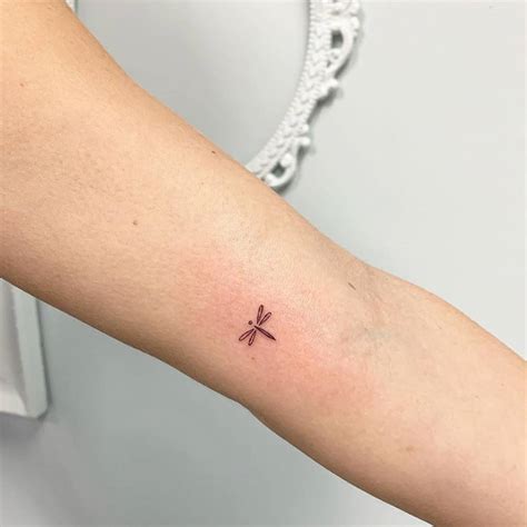 Tiny Dragonfly Tattoo