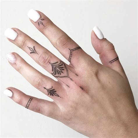 Tiny Hand Tattoo Designs