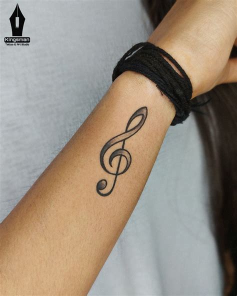 Tiny Music Symbol Tattoos