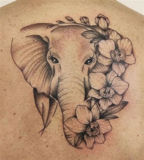 Top 30 Trendy Elephant Flower Tattoo Designs Inku Paw