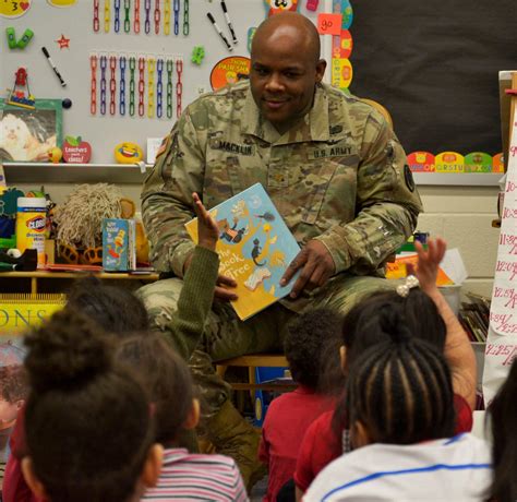 Troop Support Military Visit Local Elementary School For Read Across