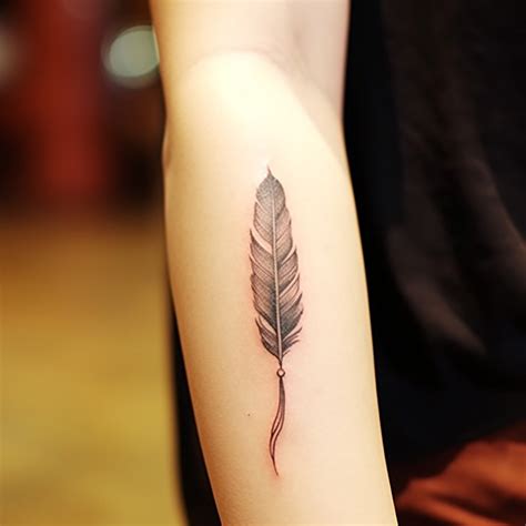 Unlock The Powerful Small Feather Tattoo Meaning 2024